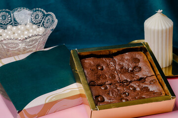 Delicious brownies in a gift box, perfect for a sweet treat or special occasion. Indulge in rich...