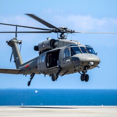 Military helicopter in flight over the ocean