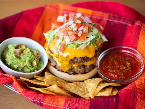 Open-Faced Brioche Bun Burger with Egg, Avocado, and Herb Fries