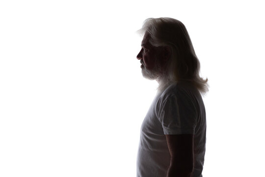 silhouette portrait of aged man with long hair on whitebackground, profile of old bearded man, life concept