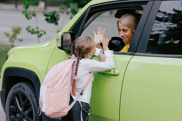 Mother and Daughter Say Goodbye Before School Drop Off Emotional Back to School Morning