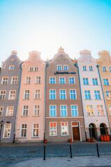Gdansk with Motlawa river in Poland. Old town colourful house with saint Marys church i main square.