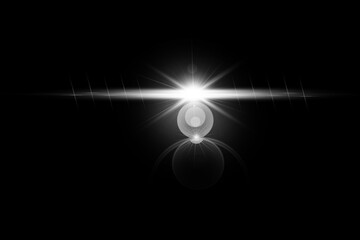 Bright sunlight shine creates lens flare light leak effects in dark background