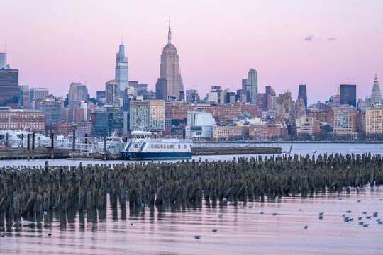 Manhattan skyline with Empire State Building seen from Hoboken, New Jersey, USA