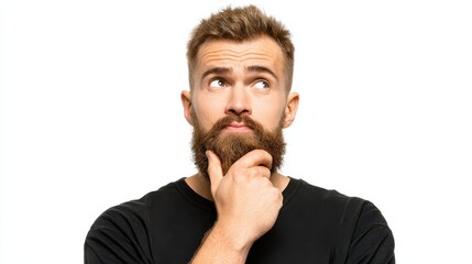 Fototapeta premium Image of hesitant unshaven European male with thick beard, holds chin, purses lips with clueless expressions, doubts what to eat delicious for supper, isolated over white background. What to choose?,
