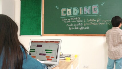 Girl writing engineering prompt by using AI software or programing system to generate AI on table...