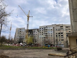 Kharkiv, Ukraine - summer 2022–2025: Destroyed and burned apartments in a multi-storey residential building. Residential area Saltovka. War in Ukraine.