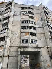 Kharkiv, Ukraine - summer 2022–2025: Destroyed and burned apartments in a multi-storey residential building. Residential area Saltovka. War in Ukraine.