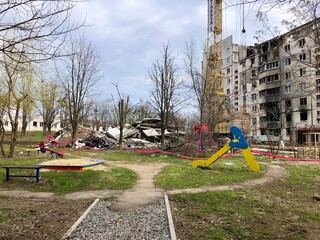 Kharkiv, Ukraine - summer 2022–2025: Destroyed and burned apartments in a multi-storey residential building. Residential area Saltovka. War in Ukraine.