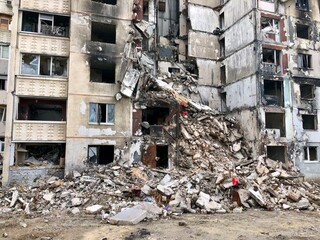 Kharkiv, Ukraine - summer 2022–2025: Destroyed and burned apartments in a multi-storey residential building. Residential area Saltovka. War in Ukraine.