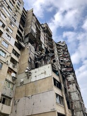 Kharkiv, Ukraine - summer 2022–2025: Destroyed and burned apartments in a multi-storey residential building. Residential area Saltovka. War in Ukraine.