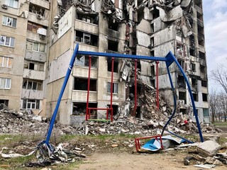 Kharkiv, Ukraine - summer 2022–2025: Destroyed and burned apartments in a multi-storey residential building. Residential area Saltovka. War in Ukraine.