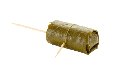 Close up shot of a single dolma wrapped in a grape leaf with a toothpick on a black background on transparent background