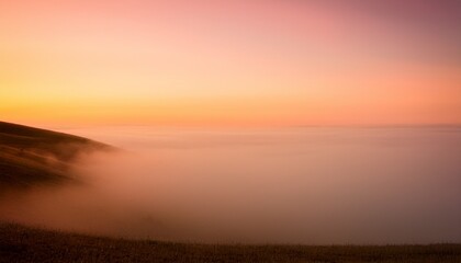 fog softly rolling into a gradient pastel peach and orange backdrop with diffused lighting highlighting its smooth flow