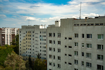 Panoramic view of gray apartment blocks from the communist era, typical of Eastern European urban...