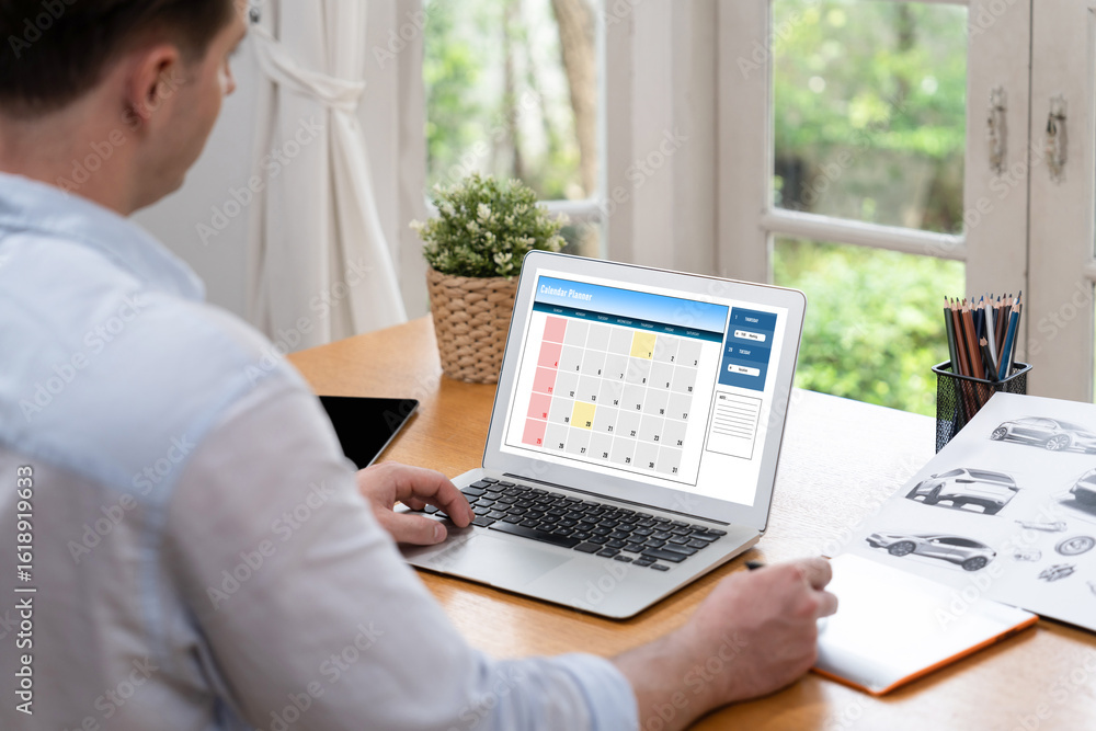 Aufkleber calendar on computer software application for brisk schedule planning for personal organizer and onl