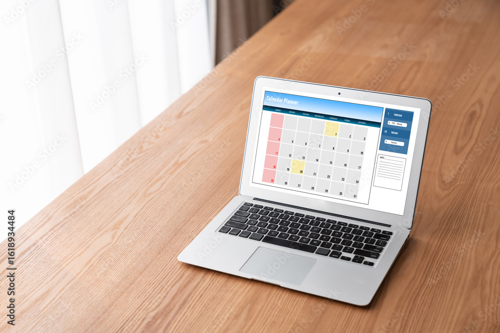Poster calendar on computer software application for modish schedule planning for personal organizer and on