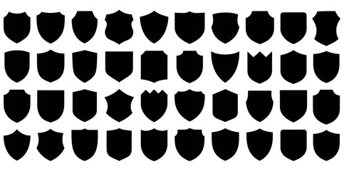 Shield silhouette icons. Shield silhouette vector set design. Medieval black silhouettes of different shapes, security and authority heraldic symbol, blank protection label. 