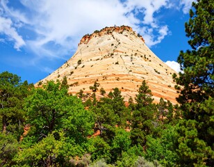 Mountain peak with layered colors and forest