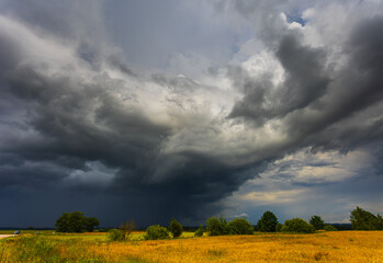 Dramatic storm clouds in the sky, dark severe storm clouds, supercell.