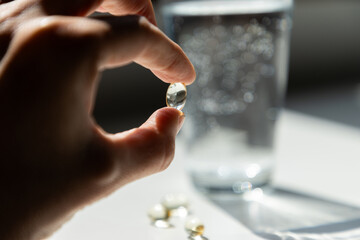 taking pills vitamins or supplements conceptual image