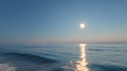 Tranquil seascape with a full moon reflecting on the ocean surface at twilight, creating a serene atmosphere.