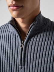 Close-up of Man in Blue Knit Zip Neck Sweater