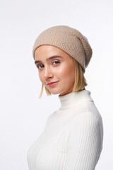 Young Woman in Beanie and Turtleneck - Studio Portrait