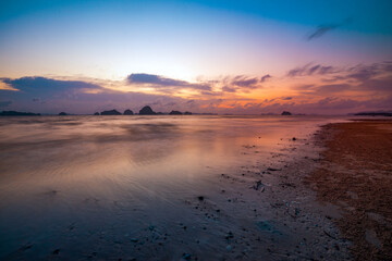 Beautiful sunset at Tubkaek Beach in Krabi, Thailand, with the islands of Than Bok Khorani National Park
