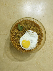 Delicious Ramen Noodles with Sunny Side Up Egg Overhead View