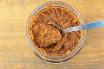 Jar of Homemade Vegetable Spread - Top View with Spoon Inside