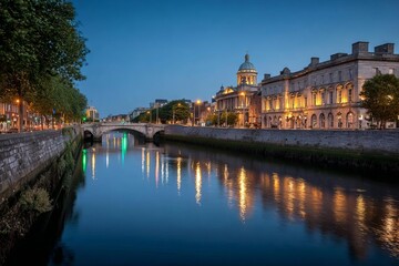 Obraz premium A tranquil view of a river reflecting the lights of beautiful buildings on a calm evening