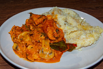 Catfish stew with potato dumplings