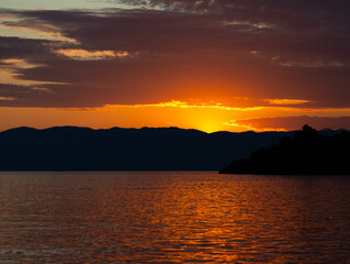 Naklejka premium Magical sunset by the sea, on vacation in Croatia, Krk Island
