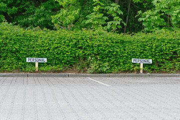 Reserved Parking Spaces with Personal Signs