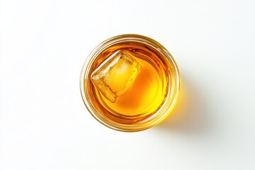 Top view of a whiskey glass with ice isolated on white background