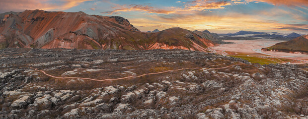 Aerial View of Rhyolite Mountains and Lava Field in Iceland at Sunset