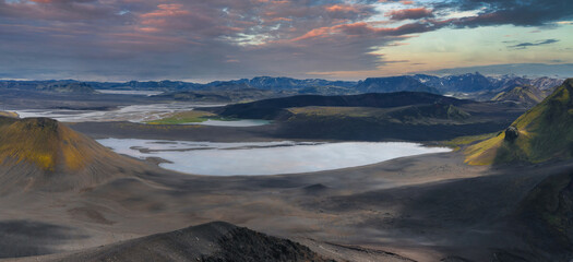 Aerial View of Icelandic Highlands with Lake and Volcanic Terrain