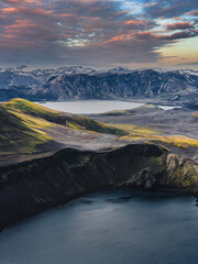 Aerial View of Icelandic Crater Lake and Snow Capped Mountains at Sunset