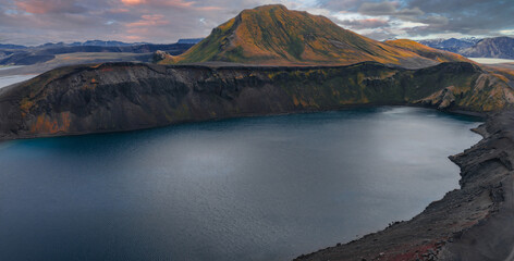 Volcanic Crater Lake with Colorful Mountain at Sunrise or Sunset