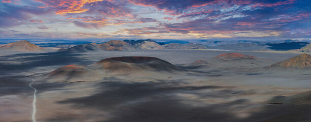 Sunset Over Icelandic Volcanic Landscape with Craters and Hills