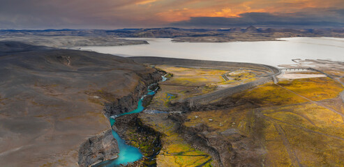 Aerial View of Turquoise River and Canyon in Iceland at Sunset