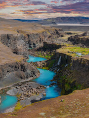 Sigoldugljufur Canyon with Waterfalls and Turquoise River at Sunset