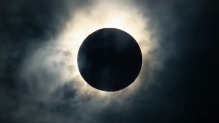 A partial solar eclipse observed in the sky with the sun and moon aligned - Powered by Adobe