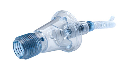 A close up shot of a clear plastic medical device with tubing on a black background studio shot