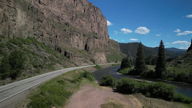 Aerial of Rio Grande River in Creede Colorado in canyon next to highway 149