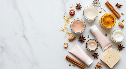 Natural beauty products and ingredients arranged on a marble surface