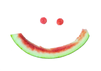Smiley face made of watermelon rind isolated