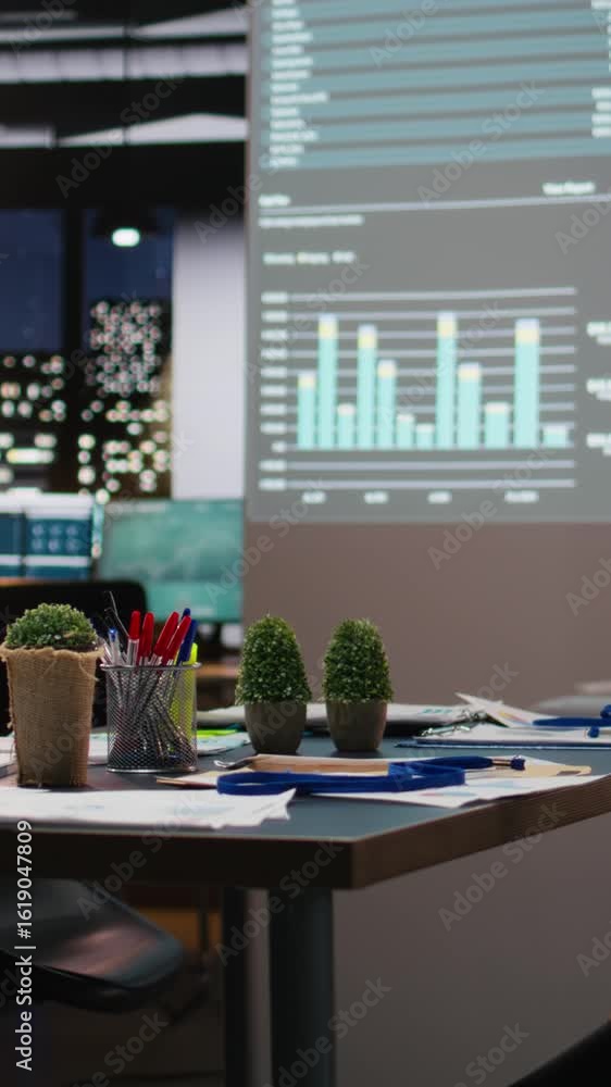 Poster vertical video professional workspace in a multinational enterprise shows an empty dark office after