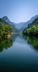 Fototapeta premium Serene mountain lake, calm water reflecting hills, peaceful valley landscape, nature background, travel poster